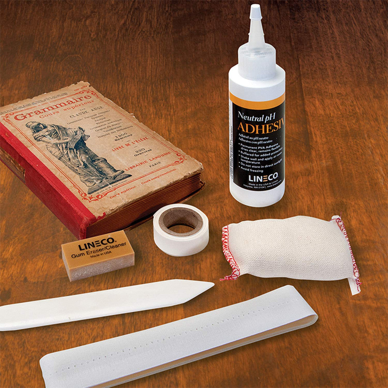 Lineco Book Repair Tool Kit for Simple Repairs and Cleaning, Including Book Repair Tape 1" x 36", Mending Tissue, 0.5" x 12ft, Bone Folder, Cleaning Pad, Neutral pH Adhesive 4 oz, Gum Eraser.